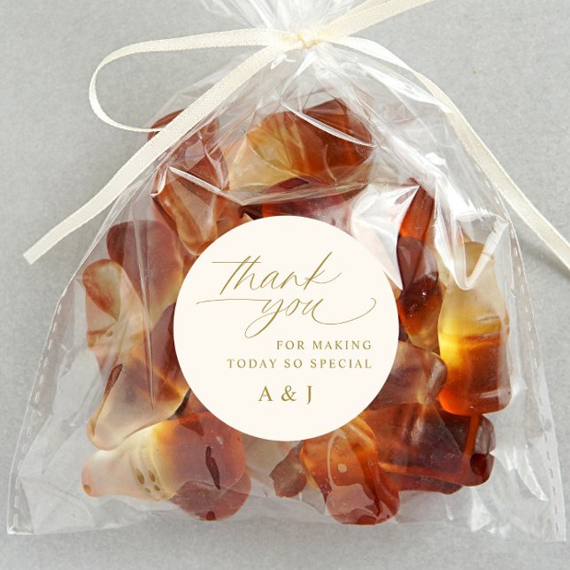Adesivo Redondo Casamento Dourado romântico e creme de marfim Obri (Wedding thank you stickers on candy bag favors - gold and light cream / ivory - romantic script)