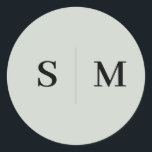 Adesivo Redondo Casamento elegante do Monograma Verde Sage<br><div class="desc">Adicione um toque de elegância aos seus detalhes de casamento com este adesivo personalizado com o monograma do casal no centro, criando um ponto focal refinado. O texto é lindamente renderizado em uma fonte serif elegante, oferecendo um eterno e um design sofisticado. Ideal para selar convites de casamento, favores ou...</div>