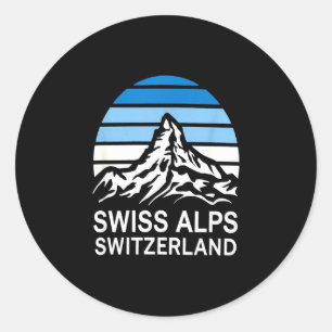 Adesivo Redondo Cena retrô dos Alpes suíços com céu listrado