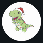 Adesivo Redondo Dinosaur Christmas Snow Winter T-Rex Dino<br><div class="desc">The T-Rex for Christmas with fairy lights. Funny animals with gifts and snow for the holidays. Also funny for Christmas in July. Dinos are cute animals and perfect for Christmas.</div>