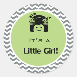 Adesivo Redondo É uma menina verde, cinza com adesivos.