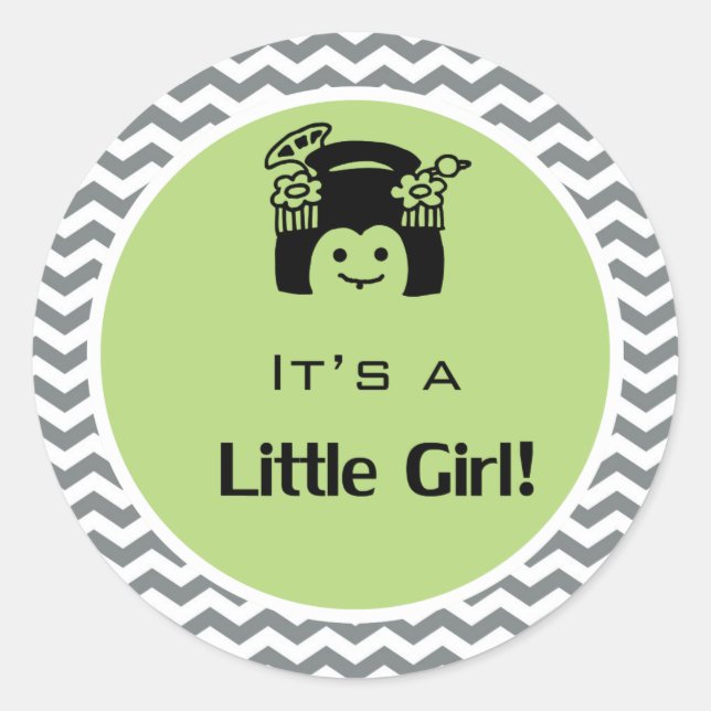 Adesivo Redondo É uma menina verde, cinza com adesivos. (Frente)