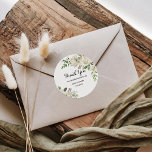 Adesivo Redondo Elegant Winter White Peony Obrigado Favor<br><div class="desc">Esse elegante obrigado de peônia branca de inverno que você privilegia os adesivos redondos clássicos são perfeitos para um casamento de destino. A design apresenta um buquê de folhas,  pintadas à mão,  arrojadas,  verdes e marrons,  com peonias brancas com aspecto fresco,  inspiradora felicidade e beleza natural.</div>
