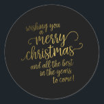 Adesivo Redondo Elegante Dourado Script Merry Christmas Gift Tag<br><div class="desc">Elegante Dourado Script Preto Merry Christmas Gift Tag Classic Round Sticker</div>