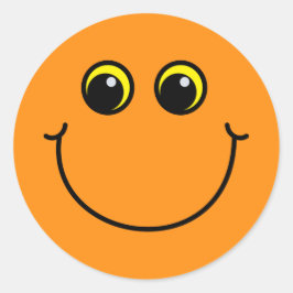 Adesivo Redondo Emoji alaranjado de sorriso enfrenta