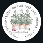 Adesivo Redondo Envelope Rustic Wood Christmas Trees Family<br><div class="desc">Vinhetas de sela de capa de Natal russa,  com cor d'água,  pinheiros de Natal,  sobre um fundo de madeira,  e o nome da sua família sobre um fundo de madeira leve. Consulte a coleção de cheios de peças correspondentes para este design em: https://www.zazzle.com/collections/rustic_pine_trees_christmas-119221021302253069</div>