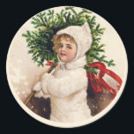 Adesivo Redondo Feriado da Vintage French Christmas Tree Girl<br><div class="desc">Faça-os dizer "ooh la la" quando eles abrem seu cartão de feriado enfeitado com esta ilustração de Natal francês vintage,  apresentando uma garotinha em um casaco branco e um chapéu segurando uma árvore de Natal com uma fita vermelha brilhante. Fronteira verde-escura. Veja o cartão de Natal correspondente!</div>