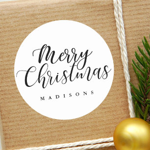 Adesivo Redondo Feriado indicado por letras do Feliz Natal da mão