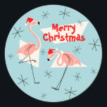 Adesivo Redondo Flamingo Santas Blue Merry Christmas sticker round<br><div class="desc">Um design de Natal animado e esquisito com um toque retrorreflector com flamingos cor-de-rosa vestindo um chapéu de Santa, formas geométricas de creme e estrelas em um fundo azul (mudança de cor). Um design personalizável para você personalizar com seu próprio texto, imagens e ideias. Uma imagem de arte digital original...</div>