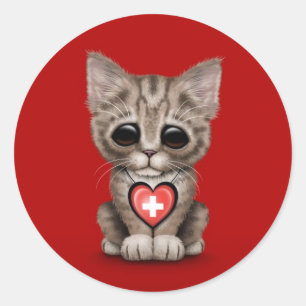 Adesivo Redondo Gato bonito do gatinho com o coração suíço da