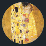 Adesivo Redondo Gustav Klimt Os Beijos<br><div class="desc">Gustav Klimt Os adesivos Beijos. pintura com óleo de trabalho de arte na canvas entre 1907 e 1908. O Beijo é a pintura mais conhecida de Gustav Klimt, uma bela obra que representa a altura do seu período de ouro. Um presente perfeito para amantes do simbolismo austríaco, Gustav Klimt, e...</div>