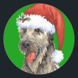 Adesivo Redondo Happy Howlidays Irish Wolfhound<br><div class="desc">Celebre a época de férias com um irlandês giro Wolfhound vestindo um chapéu de Papai Noel. Ideia de presente de excelente para a família e amigos que amam Wolfhound. Feliz Howlidays!</div>