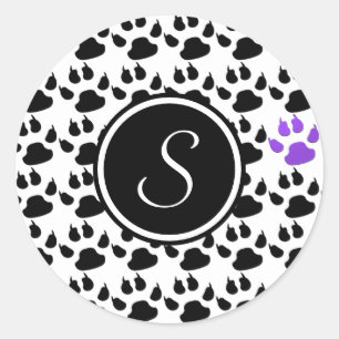 Adesivo Redondo Impressão de pata preta, branca e púrpura