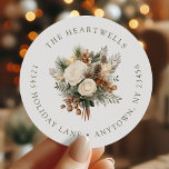 Adesivo Redondo Ivory Watercolor Floral Christmas Return Address<br><div class="desc">Este adesivo de viagem de ida e volta apresenta aquarela buquê de inverno de rosas de marfim,  tosse verde e pínus em tons neutros. Adicione o nome da sua família à volta da borda superior na fonte verde-oliva e o endereço abaixo.</div>