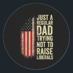 Adesivo Redondo Just A Regular Dad Trying Not To Raise Liberals<br><div class="desc">Just A Regular Dad Trying Not To Raise Liberals Father's Day Gift. Perfect gift for your dad,  mom,  papa,  men,  women,  friend and family members on Thanksgiving Day,  Christmas Day,  Mothers Day,  Fathers Day,  4th of July,  1776 Independent day,  Veterans Day,  Halloween Day,  Patrick's Day</div>
