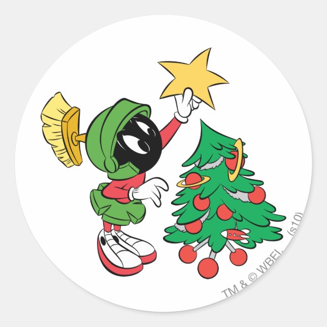 Adesivo Redondo MARVIN THE MARTIAN™ colocando estrela na árvore (Frente)