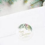 Adesivo Redondo Merry Christmas Watercolor Greenery<br><div class="desc">Este adesivo festivo é decorado com folhagem de cor vermelha,  verde e dourada e diz Feliz Natal em tipografia de guião. Facilmente personalizável. Original Watercolor © Michele Davies.</div>