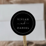 Adesivo Redondo Minimalist Dark Black Wedding Envelope Seals<br><div class="desc">These minimalist dark black wedding envelope seals are perfect for a simple wedding. The modern romantic design features classic black and white typography paired with a rustic yet elegant calligraphy with vintage hand lettered style. Customizable in any color. Keep the design simple and elegant, as is, or personalize it by...</div>