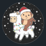 Adesivo Redondo Monkey Lama Christmas Snow Winter Animals Classic<br><div class="desc">The monkey rides at Christmas on the Lama. Funny animals with gifts and snow to the holidays. Also funny for Christmas in July. Monkeys are sweet animals and perfect for Christmas.</div>
