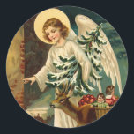 Adesivo Redondo Natais vintages Anjo com veado<br><div class="desc">Estilo de Vintage carregando anjo de Natal uma árvore de Natal e uma rena entregando presentes festivos e maçãs na véspera de Natal</div>