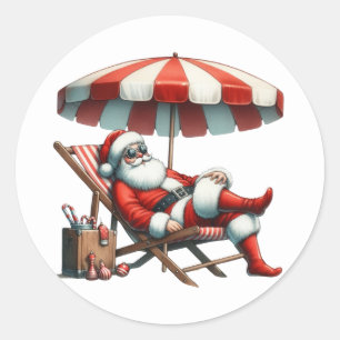 Adesivo Redondo Natal com Papai Noel sob um Guarda-sol de Praia