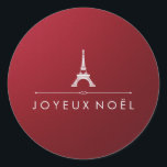 Adesivo Redondo Natal francês Joyeux Noel Red e Silver Chic<br><div class="desc">Estas vinhetas de Natal de Natal chique dizem "Joyeux Noël", ou "Feliz Natal" em francês, mas, se assim o desejar, pode mudar a redação usando a modelo. O fundo do adesivo tem um aspecto metálico vermelho sutil e a Torre Eiffel, um divisor elegante, e seu texto aparece em prata. (Observe...</div>