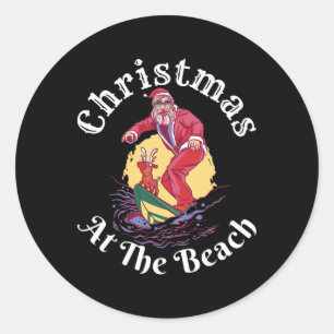 Adesivo Redondo Natal Na Praia Santa Engraçado Surfando Com Rena