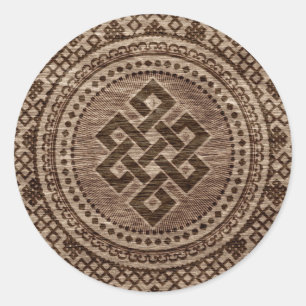 Adesivo Redondo Nó infinito decorativo na superfície de madeira