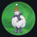Adesivo Redondo Ovelhas bonitas em Santa Chapéu em Verde<br><div class="desc">Ovelha Festiva de Parada Animal em Presentes e Decorações de Natal Verde Texturados apresenta nossa divertida trabalho de arte de uma linda ovelha branca e preta decolada em um chapéu de Papai Noel contra um fundo verde texturizado pintado digitalmente pelo ilustrador do livro infantil, Traci Van Wagoner. Na parte de...</div>