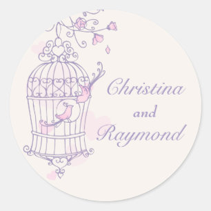 Adesivo Redondo Pássaros roxos e rosados abrem a gaiola.
