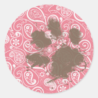 Adesivo Redondo Pawprint bonito em uma pia rosa escura