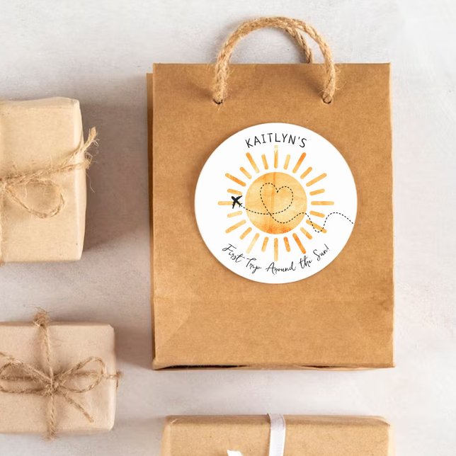 Adesivo Redondo Primeira viagem em torno do primeiro aniversario d (Criador carregado)