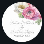 Adesivo Redondo Romântica Cor de Água Rosa e Branco Ranunculus<br><div class="desc">Estas etiquetas românticas de adesivos florais apresentam um fundo branco simples com flores ranóculas brancas e cor-de-água. Um delicado buquê de ranúnculo e verde é ilustrado no topo. Os nomes das amostras de um novo casal e a data do casamento são impressos na parte superior. Você pode personalizar os adesivos...</div>