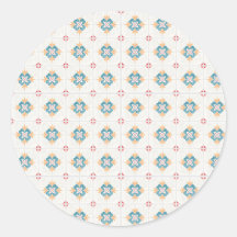 Round sticker with intricate blue and yellow 