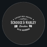 Adesivo Redondo Scrooge e Marley Counting House Christmas Carol<br><div class="desc">Scrooge e Marley Counting House Christmas Carol Bah Humbug</div>