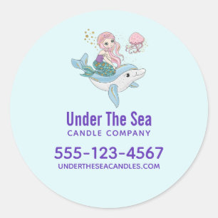 Adesivo Redondo Sereia pilotando um golfinho sob o negócio do mar