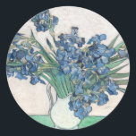 Adesivo Redondo Subidas | Vincent van Gogh<br><div class="desc">Irrises (1890) | Arte original do artista poste-impressionista neerlandês Vincent Van Gogh (1853-1890). A pintura retrata uma vida estática com um buquê de flores azuis em uma mesa verde sobre um fundo branco cremoso. Use as ferramentas de design para adicionar texto personalizado ou personalizar a imagem.</div>