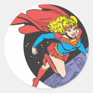 Adesivo Redondo Supergirl pula no espaço