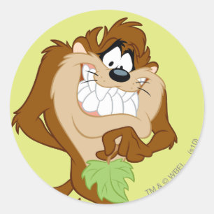 Adesivo Redondo TAZ™ segurando uma folha