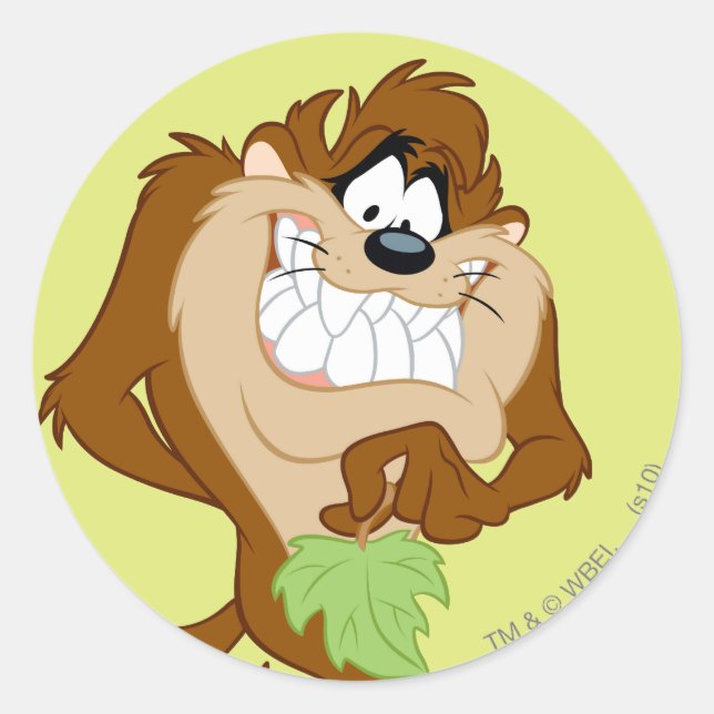 Adesivo Redondo TAZ™ segurando uma folha (Frente)