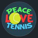 Adesivo Redondo Tênis Love Blue Christmas<br><div class="desc">Eu adoro jogar tênis. Um bonito presente de jogador de tênis com uma bola amarela de tênis como O in Love. Tênis do Peace Love escrito em verde,  vermelho e azul.</div>