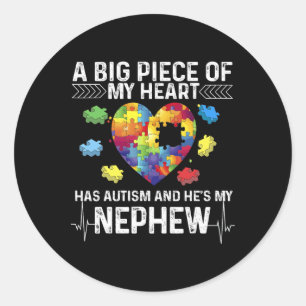 Adesivo Redondo Um grande pedaço que meu coração tem autismo e é m