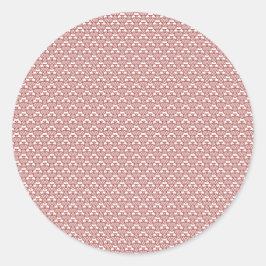 Adesivo Redondo Um tapete padronizado com motivos vermelhos e cast