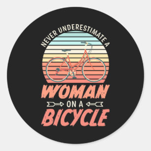Adesivo Redondo Uma Mulher Numa Bicicleta