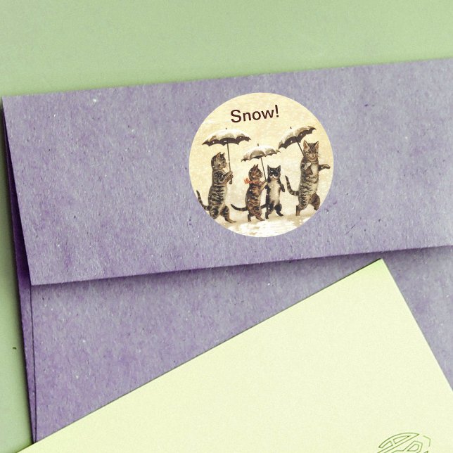 Adesivo Redondo Vintage Cats Umbrellas Snow (Four striped cats walking upright with umbrellas in snow on yellow round stickers.)