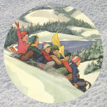 Adesivo Redondo Vintage Christmas, Children Sledding on a Mountain<br><div class="desc">Vintage illustration Merry Christmas holiday snowscape design featuring children,  a group of boys and girls having fun sledding down a snow covered hill. Mountains,  trees and a lake complete this beautiful winter landscape. Reminds me of winters in Donner in Lake Tahoe.</div>