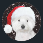 Adesivo Redondo Westie Christmas<br><div class="desc">West Highland Terrier dog,  ou Westie,  veste um chapéu de Papai Noel sobre um fundo de estrelas de Natal que ama o adesivo de Natal</div>