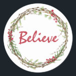 Adesivo Redondo Winter Greenery Berries Wreath Christmas Acredite<br><div class="desc">Vedante de envelope festivo elegante e moderno ou adesivo de presente para o Natal com o texto "Acredite" na caligrafia vermelha e um toque de na moda do verde de inverno e da coroa de frutas. Desenvolvido exclusivamente para você pelo Happy Dolphin Studio. Se precisar de ajuda ou produtos correspondentes,...</div>
