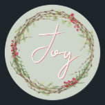 Adesivo Redondo Winter Greenery Berries Wreath Christmas Joy<br><div class="desc">Vedante de envelope festivo elegante e moderno ou adesivo de presente para o Natal com o texto "Joy" em caligrafia branca e vermelha e um verde-inverno na moda e uma coroa de frutas. Desenvolvido exclusivamente para você pelo Happy Dolphin Studio. Se precisar de ajuda ou produtos correspondentes, entre em contato...</div>
