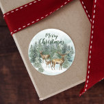 Adesivo Redondo Woodland Christmas Deer Watercolor<br><div class="desc">Uma família de veados está aninhada na floresta de inverno coberta de neve,  nestes adesivos de férias em áreas rústicas,  perfeito para adicionar o toque final de Natal às suas cartas e pacotes de presentes.</div>